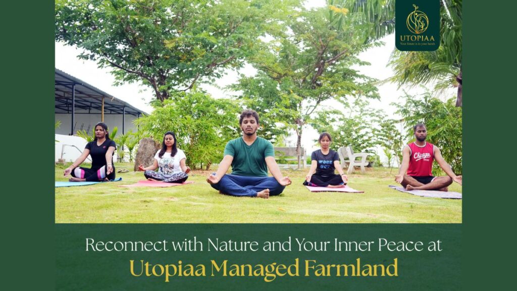 Yoga session amidst lush greenery at Utopiaa Managed Farmland, blending luxury living with natural bliss